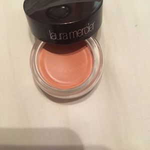 Laura Mercier lip stain color is peach glaze
